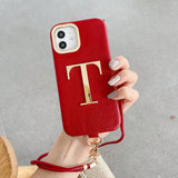 名入れ iPhone用ケース｜ゴールドイニシャル・レザー調・ストラップ付き・iPhone 12〜18対応